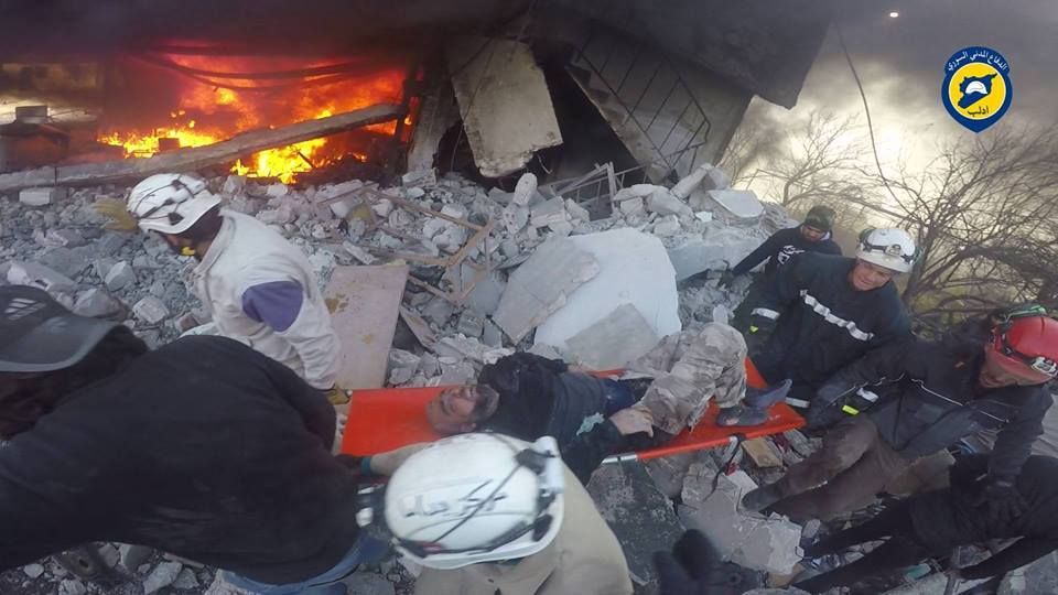 Fires blaze as White Helmets rescue a man from site of alleged Russian strike on Bdama, Dec 22nd (via White Helmets)