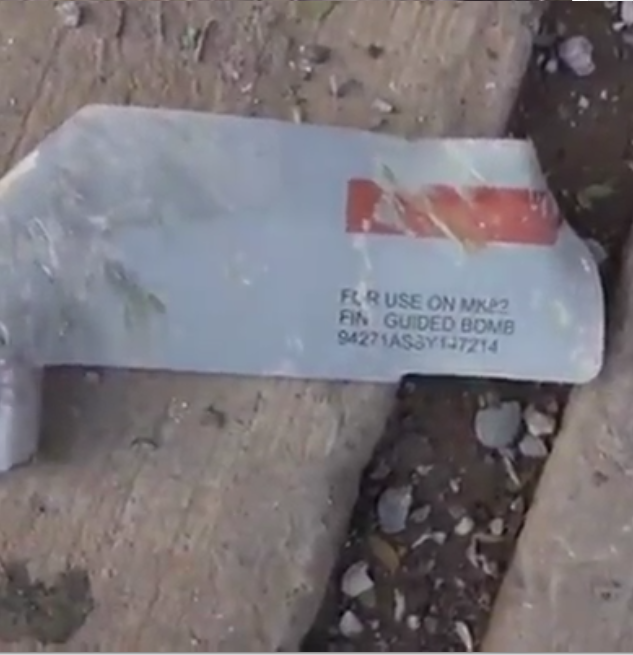 Still from video released by ISIL-linked Al A'Amaq. Appears to show remnant of a munition with English lettering. 