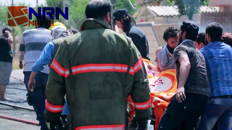 Rescuers tend to dead and injured following alleged major Coalition strike on Rashidiya, Mosul May 24th (via NRN News)