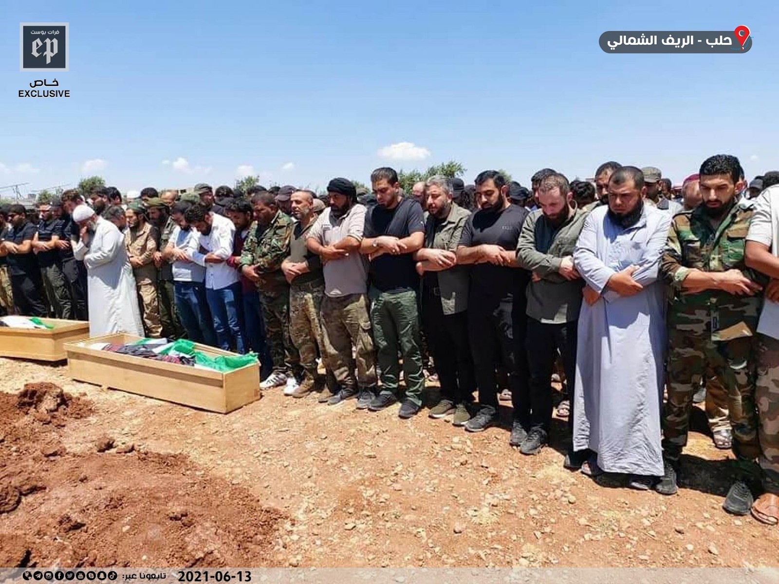 Image of mourners praying over the coffins of some of the victims killed in the bombing of Afrin on June 12, 2021. (Images posted by Euphrates Post)