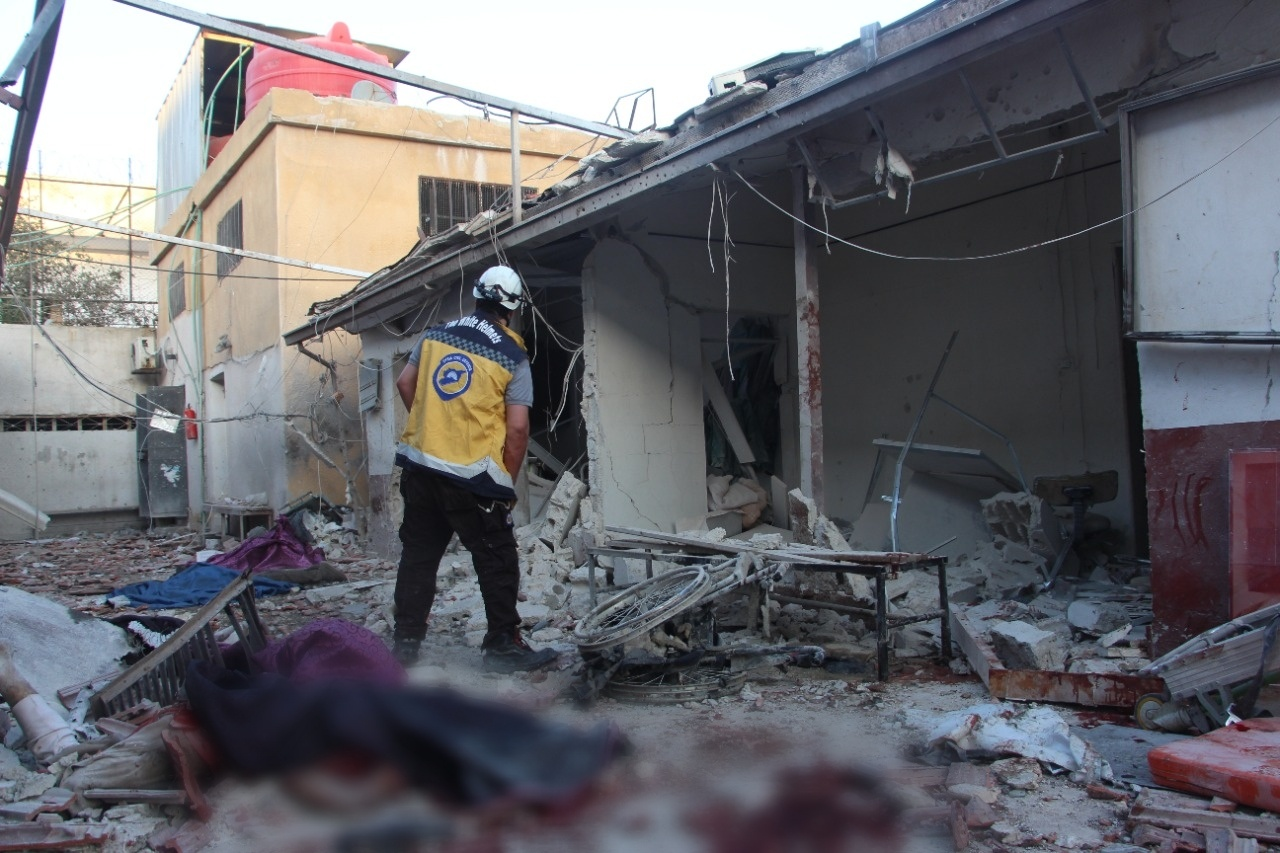 A member of the Syrian Civil Defense searching through the rubble for survivors following the airstrikes on Afrin on June 12, 2021. (Image posted by Syrian Civil Defense)