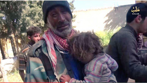 A series of stills from a video published by ISIS-affiliated media showing very graphic imagery of the dead a large proportion of them children. The video itself has been removed from youtube. [Via: SN4HR report published on May 6th 2015]