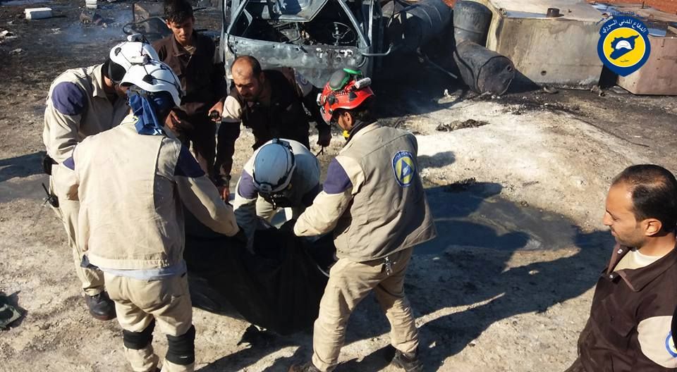 The White Helmets rescue a body in the aftermath of the strikes on Ma'arat Al Nu'ssan, Dec 15th (via White Helmets)