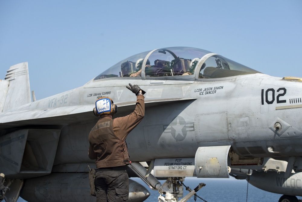 An F/A-18F Super Hornet on the flight deck of USS Dwight D. Eisenhower, Oct 16th (US Navy)