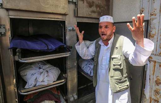 Bodies of those killed in strikes on Al Jeniya neighborhood on May 13, 2021. (Image posted by Anadolu Agency)