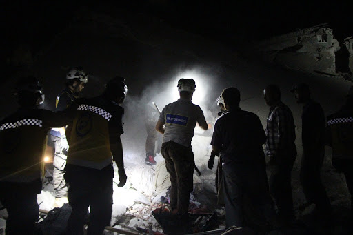 Syrian Civil Defense volunteers rescuing civilians and pulling bodies out of the rubble in Zardana after alleged Russian airstrikes on June 7th, 2020 (via SCD)