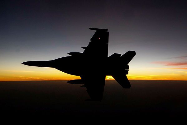 A Royal Australian Air Force F/A-18F Super Hornet is beautifully silhouetted as the sun sets over Iraq. (Aus MoD)