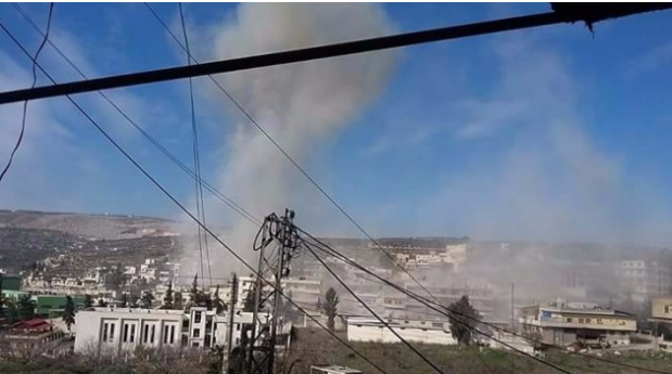 A photograph of smoke rising from where alleged Russian warplanes targeted the oil market (via Syrianpc)