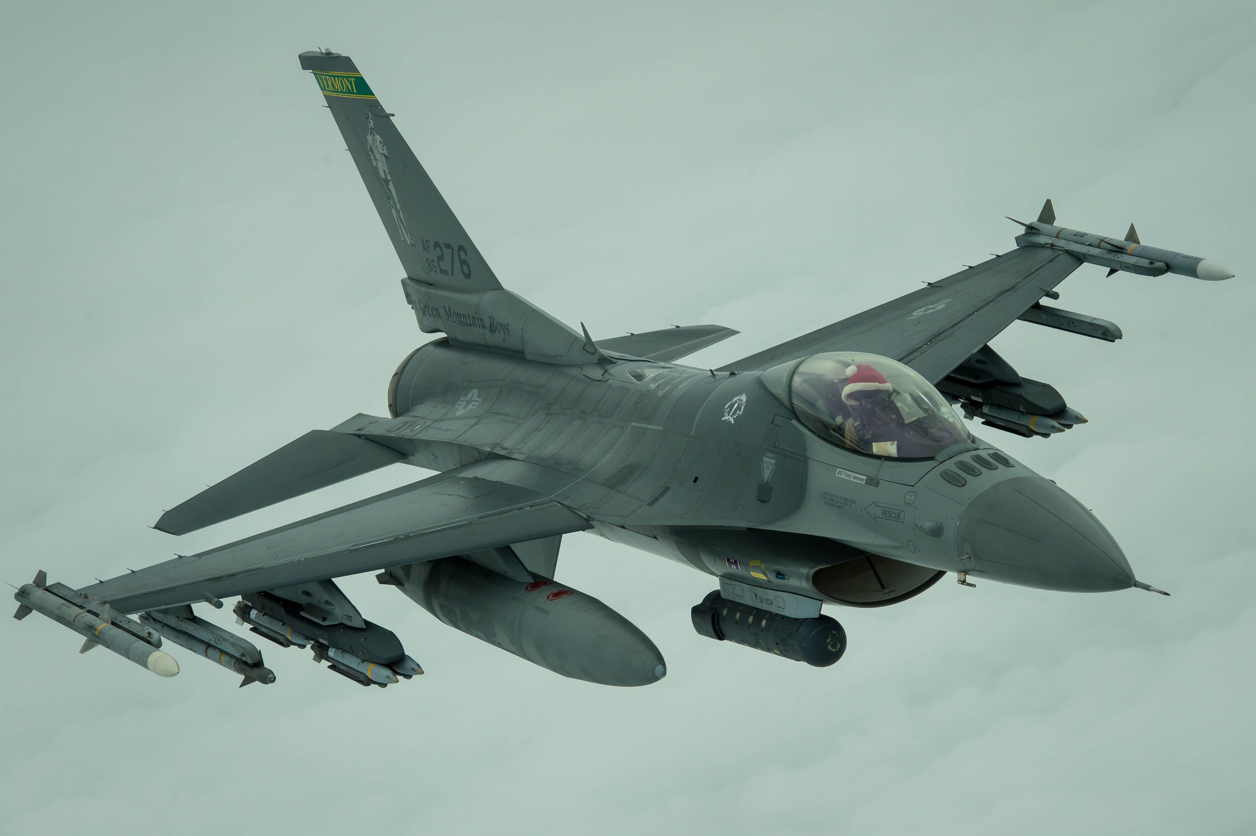 An F-16 after a successful refueling over Iraq, December. 25, 2016. "Many pilots wore a traditional red “Santa” hat while flying on Christmas Day." (U.S. Air Force/ Senior Airman Tyler Woodward)