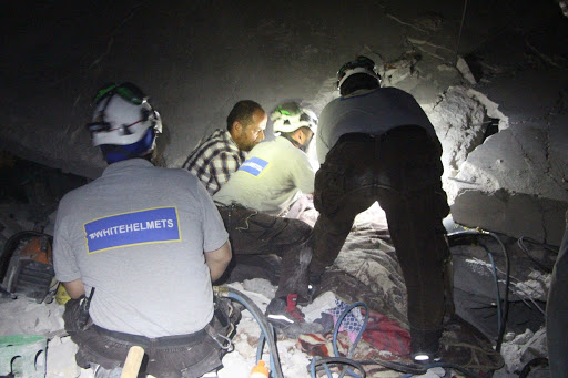 Syrian Civil Defense volunteers rescuing civilians and pulling bodies out of the rubble in Zardana after alleged Russian airstrikes on June 7th, 2020 (via SCD)