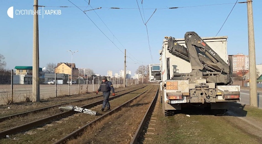 Image showing what looks to be a rocket embedded in the road following Russian shelling of Kharkiv on March 24, 2022. (Image posted by @informatsia_obstanovka)