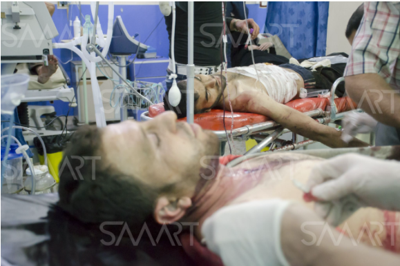 Two civilians are treated in a clinic after sustaining injuries caused by alleged Russian attacks (via Smart)