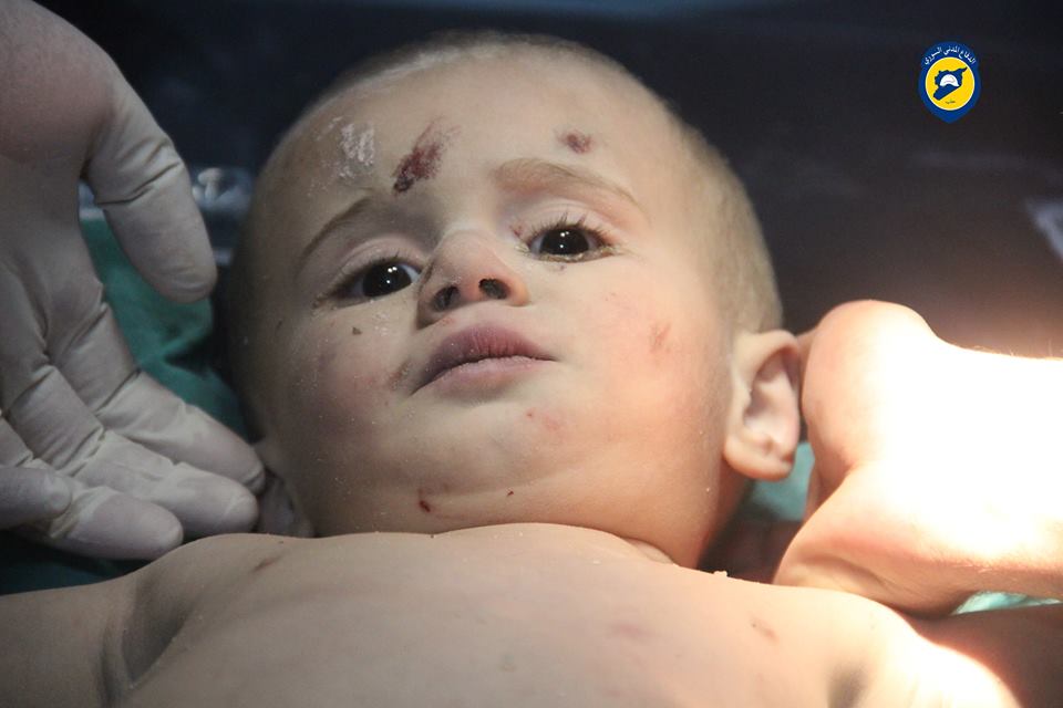 Baby Ahmad Al Rajab recovered from under the rubble after intense warplanes shelling on Al Sukkari neighborhood, Aleppo (via Aleppo White Helmets)