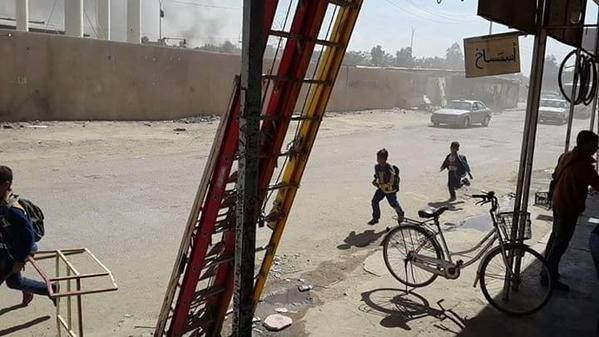 Schoolchildren fleeing an airstrike of unknown origin, Fallujah, March 3rd 2015.