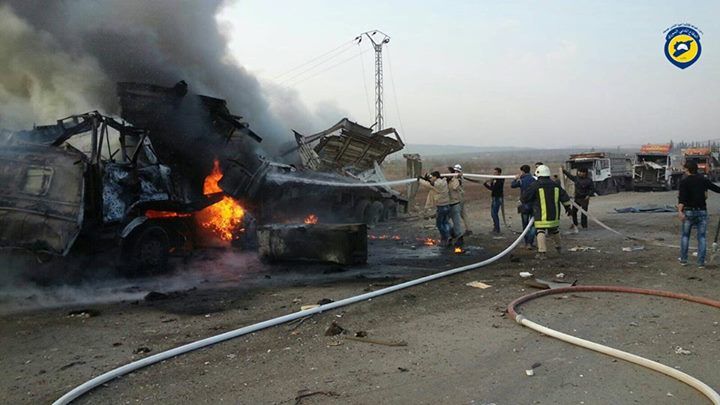 Burning trucks in aftermath of alleged Russian airstrike on Izaz, November 27th (via White Helmets)