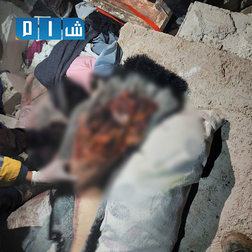 3 of 4: Pictures showed the remains of child victims after a US air drop which has reportedly killed at least eleven civilians, including at least six children (Image via Shaam)