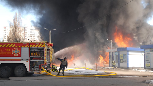a fire at the market in the Heroiv Pratsi on March 16, 2022. (Image posted by Suspilne News)