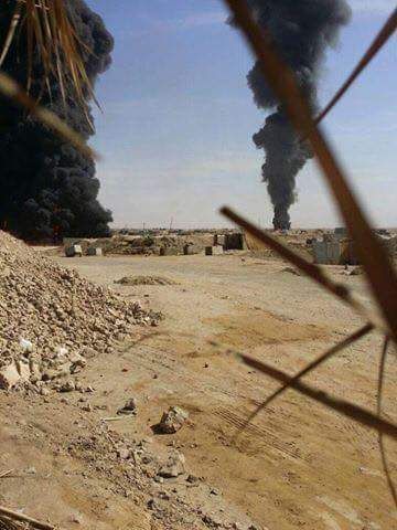 A burning oil facility in the al Baghouz dsert after being hit in a Coalition strike October 16th 2016. At least 10 civilian workers reportedly died (via Sound and Vision)
