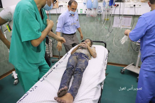 Children injured in strikes on Al Jeniya neighborhood on May 13, 2021. (Image posted by @ahm_ks90)