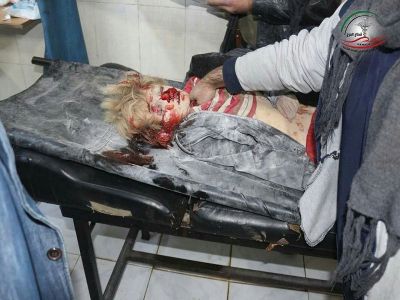 VERY GRAPHIC: The body of a child in the aftermath of the airstrike on Al Nashabiya, Dec 9th (via SNN)