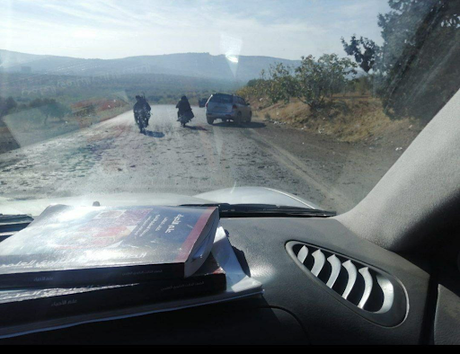 A drone struck a car traveling on the Al-Mastouma Ariha road, killing those inside. (Image posted by @SunaUnique)