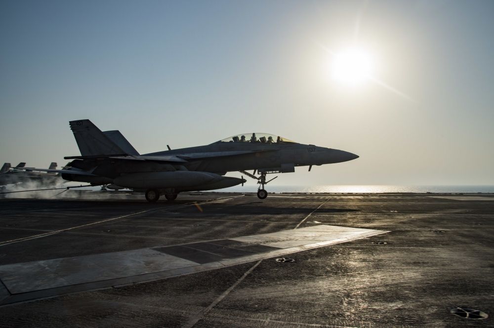 An F/A-18F Super Hornet makes an arrested landing on the flight deck of USS Dwight D. Eisenhower, Sept 18th (US Navy)