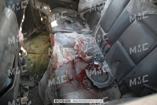 Blood of the victims on the car struck with a drone attack on the Ariha Al-Mastouma road on December 3, 2021. (Image posted by Macro Media Center)