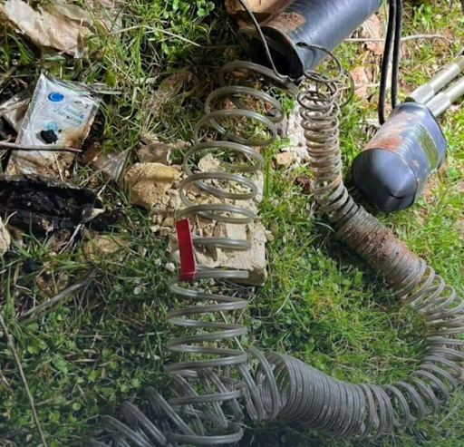 2 of 3: "Remnants of the airdrop of the American occupation in the town of Atma on the Syrian-Turkish border." (Image via @jamlyyyyy_ / Twitter)