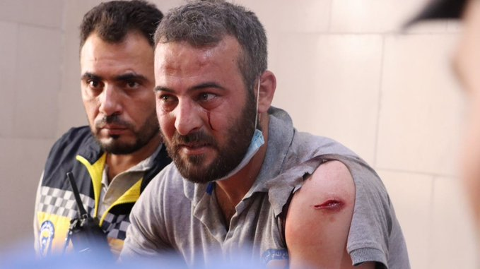 "A volunteer in the Civil Defense is waiting for his colleague Humam Al-Asi to leave the operating room, but he died as a result of the regime’s bombing of Sarja in Idlib countryside" (Image posted by @jisrtv)
