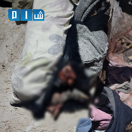 2 of 4: Pictures showed the remains of child victims after a US air drop which has reportedly killed at least eleven civilians, including at least six children (Image via Shaam)