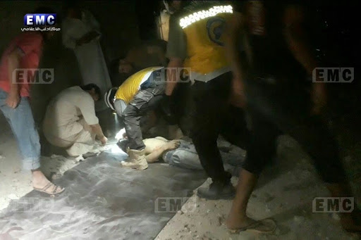 Syrian Civil Defense volunteers rescuing civilians after alleged Russian airstrikes on Zardana in Idlib, Syria on June 7th, 2018 (via EMC)
