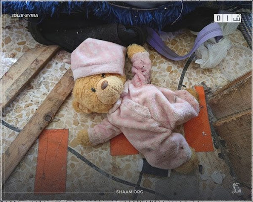 1 of 7: Shaam news uploaded photographs of the destruction and remains of the house which was targeted by a US air drop operation on February 3rd in the Atma region of northern Syria (Image via Facebook)