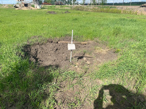 Grave discovered during the liberation of Tsyrkuny on May 10, 2022. (Image posted by Sergey Bolvinov via Facebook)