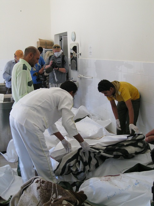 Body bags at Zliten Hospital after NATO airstrikes on Majer on August 8th, 2011 (via Global Research)
