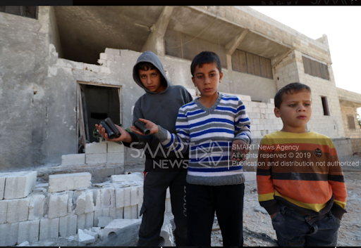 Children in the location where the US forces operation killed al-Baghdadi in Barisha village in Idlib on 26/27 October 2019 (via SMART).