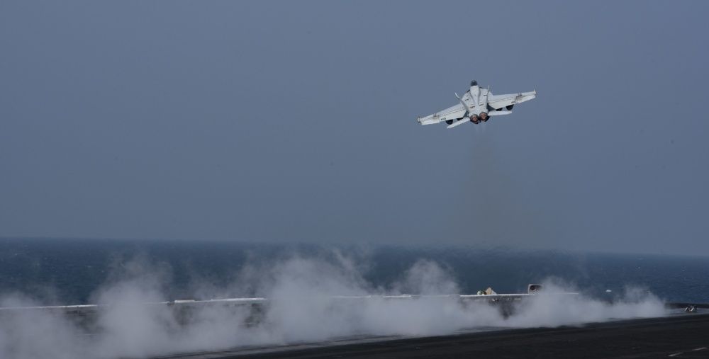 An F/A-18E Super Hornet launches from the flight deck of USS Dwight D. Eisenhower, Oct 20th (US Navy)