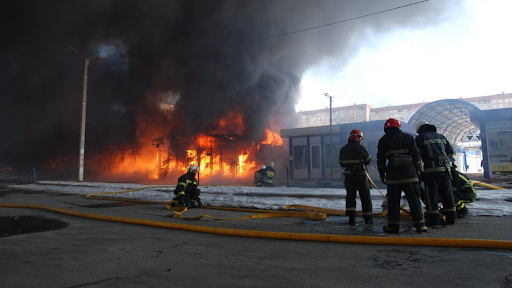 a fire at the market in the Heroiv Pratsi on March 16, 2022. (Image posted by Suspilne News)