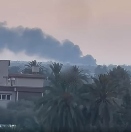 Smoke from alleged GNU airstrikes on Al Maya port on May 28, 2023. (Image posted by @libyapress2010)