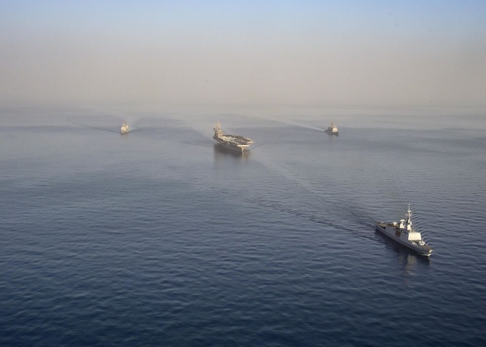 he aircraft carrier USS Dwight D. Eisenhower (CVN 69) (Ike), center, transits in formation with the French guided-missile frigate FS La Fayette (F 710), front, the guided-missile cruiser USS San Jacinto (CG 56), right, and the guided-missile cruiser USS Monterey (CG 61) (US Navy)