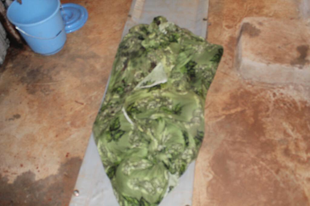 Wrapped body of a child victim of a reported US strike on Kunyo Barrow, Somalia on February 23rd 2019 (Image via al Shabaab propaganda release)