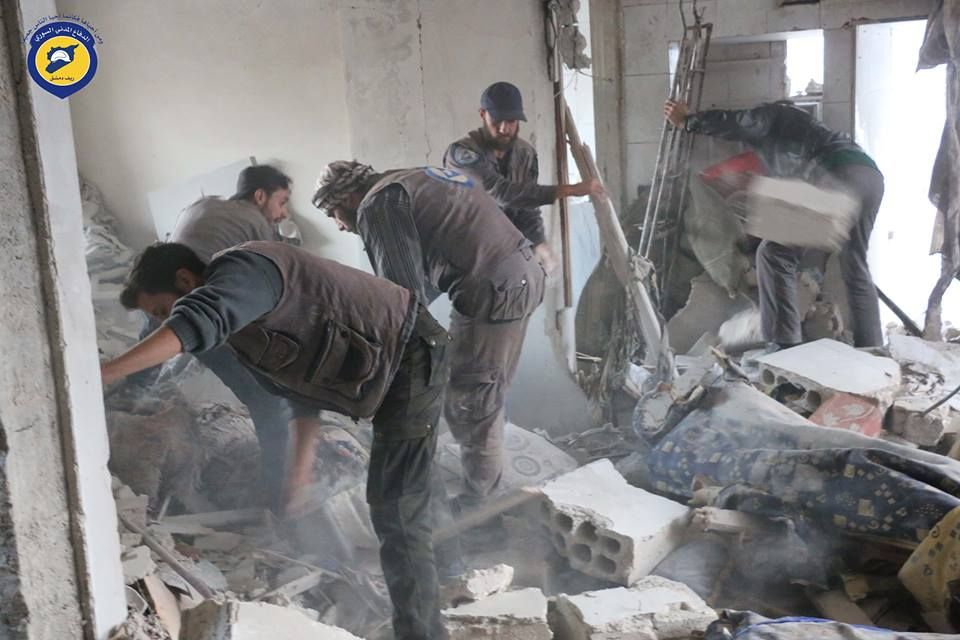 The White Helmets inspect a demolished building following an alleged Russian raid on (via The White Helmets)