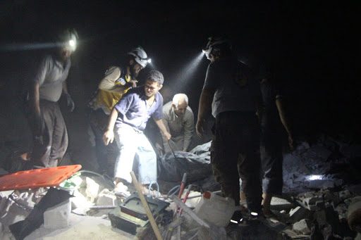 Syrian Civil Defense volunteers rescuing civilians and pulling bodies out of the rubble in Zardana after alleged Russian airstrikes on June 7th, 2020 (via SCD)