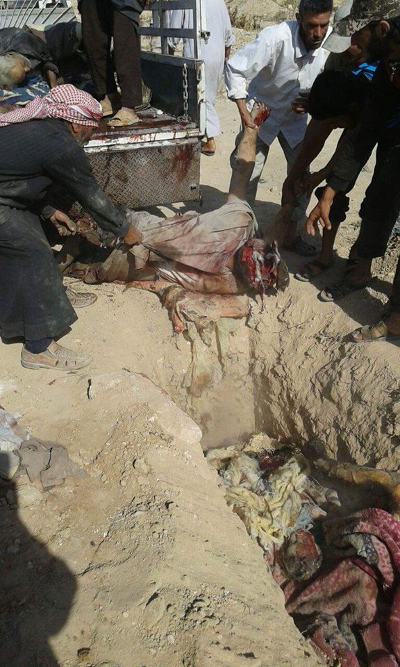 Victims of an alleged Coalition strike near Manbij July 19th are buried in a mass grave (via Manbij Mother of All Worlds)