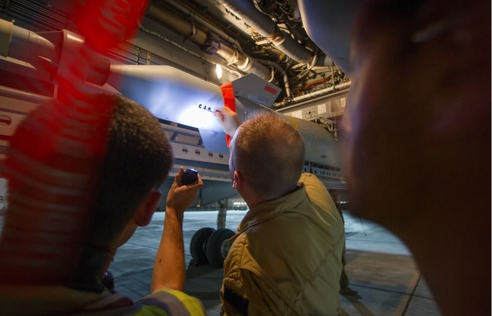 Laser-guided missile being fitted to a French Atlantique 2 (Ministère de la Défense)
