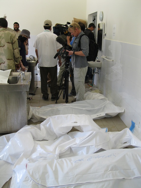 Body bags at Zliten Hospital after NATO airstrikes on Majer on August 8th, 2011 (via Global Research)