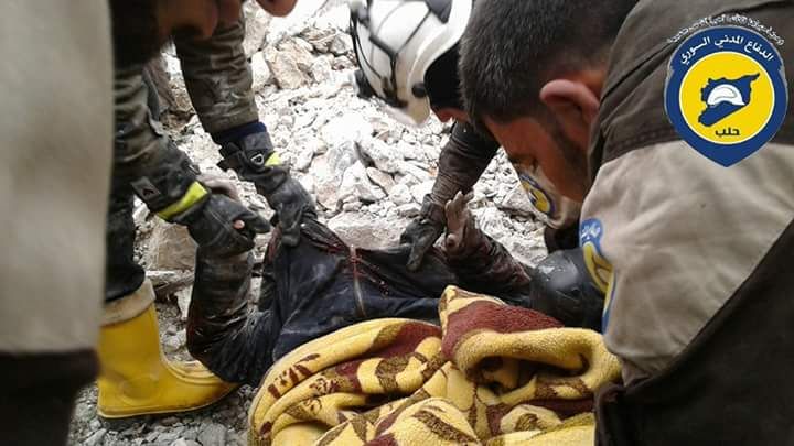 The White Helmets rescue a body from the rubble following a strike on Kafr Kasher, Feb 9th (via White Helmets)