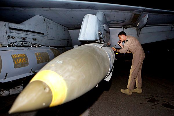 Australian Air Task Group Strike Element pilot, Squadron Leader Chris, conducts preflight checks on a F/A-18A Hornet prior to departing on a mission to strike a Deash headquarters compound in Mosul, Iraq, from Australia's main air operating base in the Middle East region. (Aus MoD)