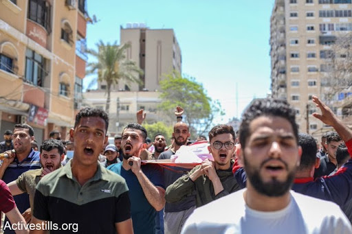 Funeral for the 10 women and children killed in Israeli strikes on Al Shati camp on May 15th, 2021. (Image posted by @activestills)