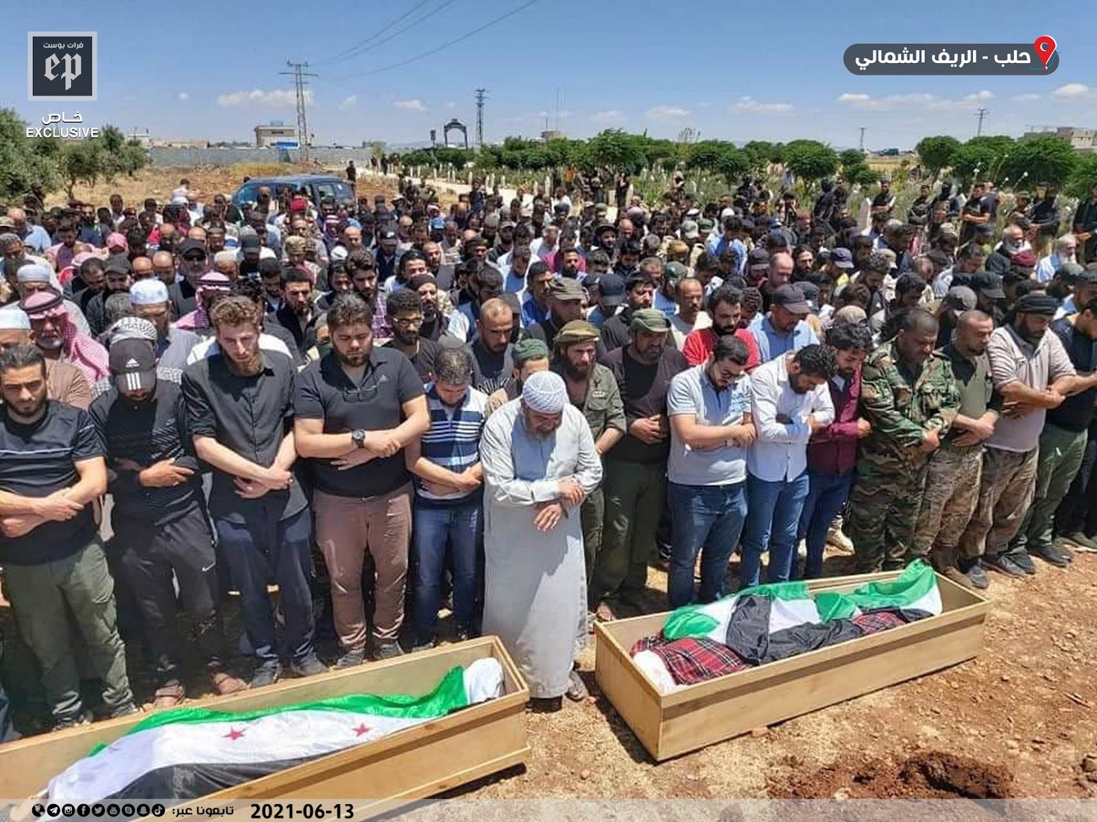 Image of mourners praying over the coffins of some of the victims killed in the bombing of Afrin on June 12, 2021. (Images posted by Euphrates Post)