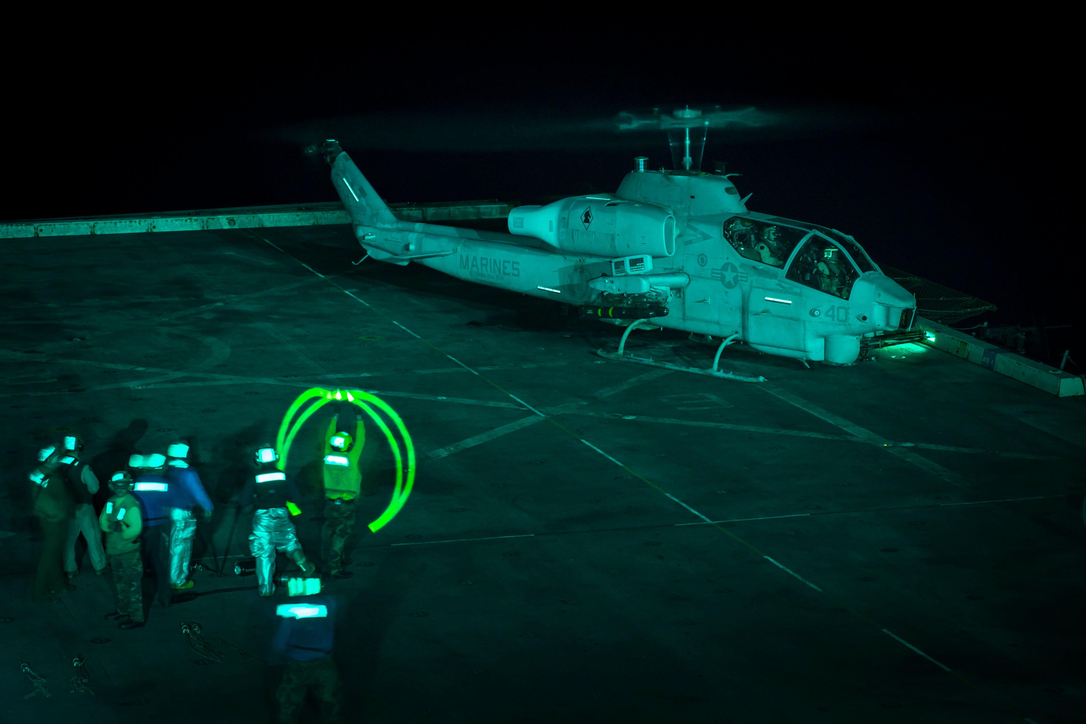 161108-N-DQ840-078 MEDITERRANEAN SEA (Nov. 8, 2016) An AH-1 Super Cobra helicopter, from the 22nd Marine Expeditionary Unit (MEU), prepares to take off for an air strike during flight operations aboard the amphibious transport dock ship USS San Antonio (LPD 17). The 22nd MEU, embarked on San Antonio, is conducting precision air strikes in support of the Libyan Government of National Accord-aligned forces against Daesh targets in Sirte, Libya, as part of Operation Odyssey Lightning. (U.S. Navy photo by Petty Officer 2nd Class Adam Austin/Released)